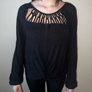 Black top with cut out at the top